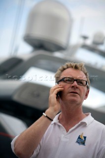 Crew using mobile telephone communication onboard superyacht  - MODEL RELEASED -