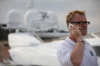 Crew using mobile telephone communication onboard superyacht  - MODEL RELEASED -