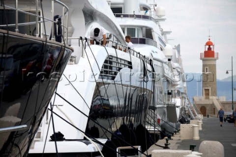 Crew working maintenance onboard superyacht   MODEL RELEASED 