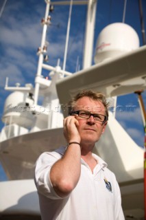 Crew using mobile telephone communication onboard superyacht  - MODEL RELEASED -