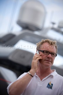 Crew using mobile telephone communication onboard superyacht  - MODEL RELEASED -