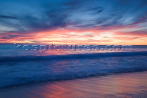 Colourful sunset over a sandy beach