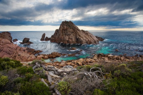 Moody sky over dramatic coastline