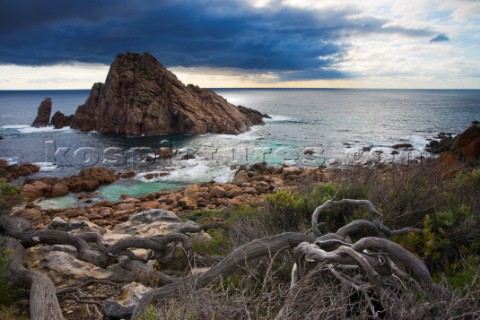 Moody sky over dramatic coastline