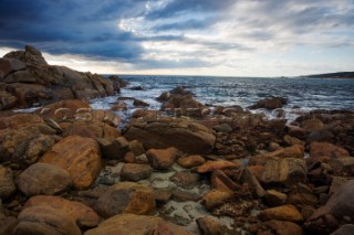 Moody sky over dramatic coastline