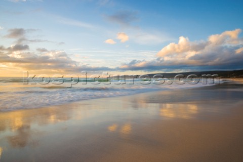 Colourful sunset over a sandy beach