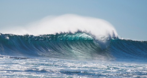 Huge waves break on the shore