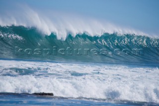 Huge waves break on the shore