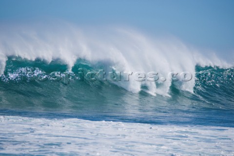 Huge waves break on the shore