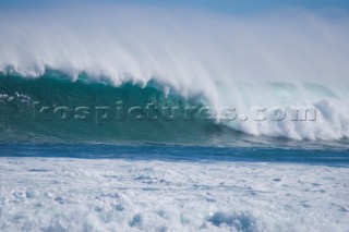 Huge waves break on the shore