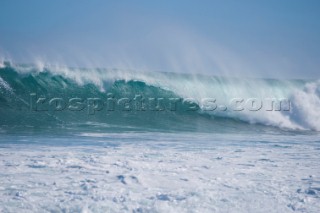 Huge waves break on the shore