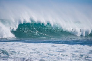 Huge waves break on the shore