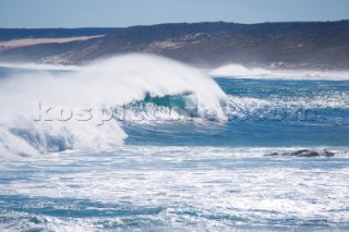 Huge waves break on the shore