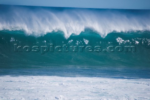 Huge waves break on the shore