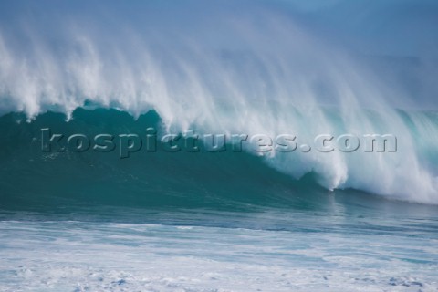 Huge waves break on the shore