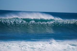 Huge waves break on the shore