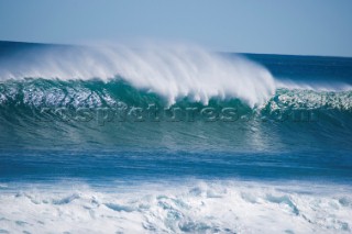 Huge waves break on the shore