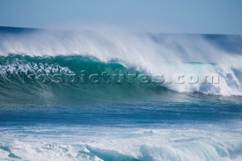 Huge waves break on the shore