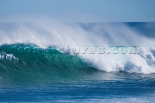 Huge waves break on the shore