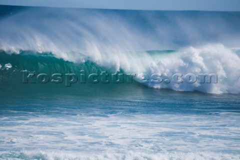 Huge waves break on the shore