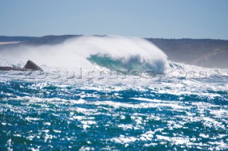 Huge waves break on the shore