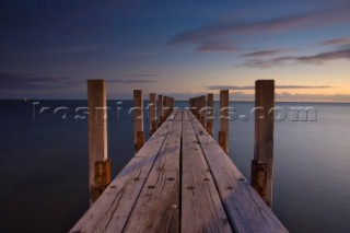 Dusk over a wooden jetty