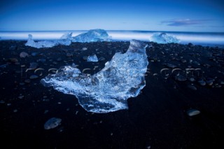 Large chunks of ice regularly wash up on the volcanic southern shoreline of Iceland