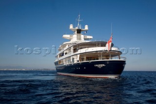 Luxury superyacht Leander owned by Sir Donald Gosling moored by Les Iles des Lerins near Cannes, South of France.