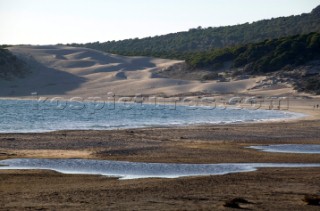 Huge sand dunes on a sandy beach in Tarifa, Spain, near Gibraltar.