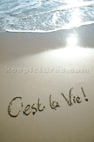 Cest La Vie its life sign writing message on a sandy beach in Tarifa Spain near Gibraltar