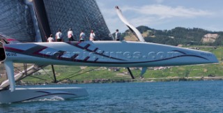 Alinghi 5, the giant catamaran multihull which will defend the 33rd Americas Cup sailing on Lake Geneva. (Editorial Only)