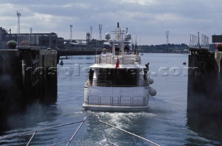 Fairline Squadron 74 passes through the Thames Barrier in London