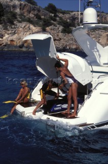 Stowing awa y jetski on Fairline Targa 48