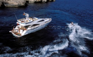 A luxurious Fairline Squadron 58 at rest in a tranquil bay in Majorca