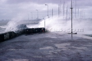 Storm waves crashing over breakwater in Punta del Este, Uraguay