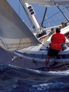 Crew to leeward trimming the 3DL jib onboard the Swan 60 Highland Fling racing upwind