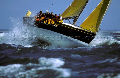 Farr 40 Dignity crashing through rough seas in strong winds  Commodores Cup 2000