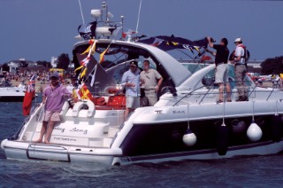 Spectators watch the Trafalgar 200 celebrations from a power boat