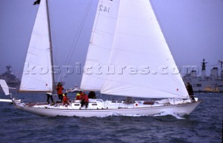 Gipsy Moth having undergone restoration sailing once again in 2005 during Trafalgar 200. Gipsy Moth IV under sail in the Solent at the Fleet Review in June 2005