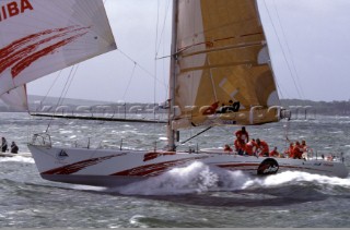 Whitbread 60 Tokio blasts along on the plane under spinnaker at the finish of the Whitbread Round the World Race 1993/1994