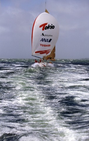 Whitbread 60 Tokio blasts along on the plane under spinnaker at the finish of the Whitbread Round th