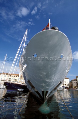 Close up of bow of a superyacht in St Tropez Harbour Alonside a large sailing superyacht