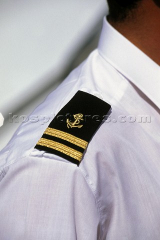 Detail of ship officers epaulette on shoulder