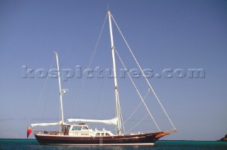 A large ketch rig sailing yacht at anchor