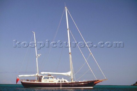 A large ketch rig sailing yacht at anchor