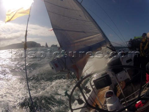 Helmsman driving upwind in rough seas onboard the Norwegian J133 Madjus during the JP Morgan Round t