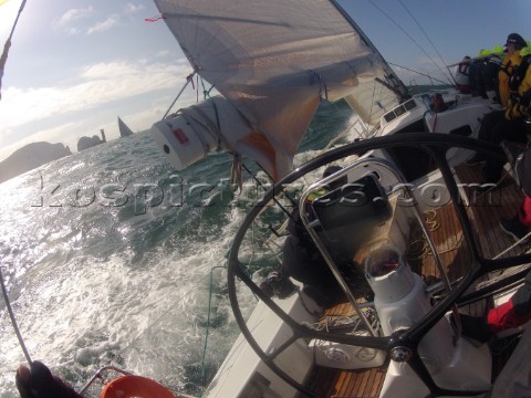 Helmsman driving upwind in rough seas onboard the Norwegian J133 Madjus during the JP Morgan Round t