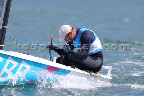 WEYMOUTH ENGLAND  AUGUST 5th Ben Ainslie of Great Britain wins Gold Medal in the Mens Finn sailing d