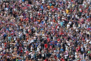 WEYMOUTH, ENGLAND - AUGUST 5th: Ben Ainslie of Great Britain wins Gold Medal in the Mens Finn sailing dinghy class at the London 2012 Olympic Games at Weymouth Harbour on August 5th, 2012 in Weymouth, England. (©Kos Picture Source/Getty Images)