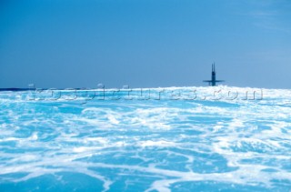 Maxi Yacht Rolex Cup 2001. Porto Cervo, Sardinia. American submarine (possibly a Los Angeles class fast attack sub) submerging.